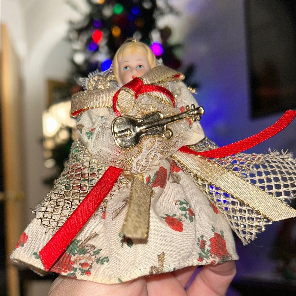 Festive Angel Ornament with Red and Gold Accents